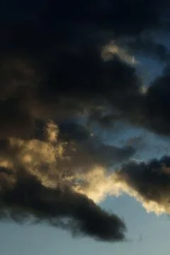 Dramatic Sky With Dark Storm Clouds. Stock Photos
