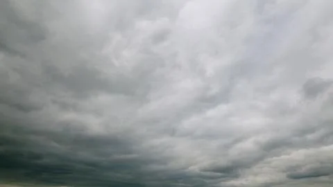 A Dramatic Sky Displaying Gray Clouds Was Beautifully Captured Overhead Above Us Stockfoto's