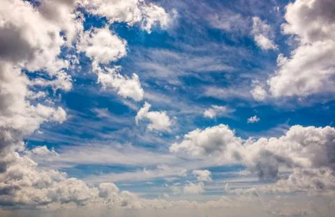 Dramatic sky with dynamic cloud arrangement Stock Photos