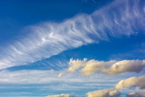 Dramatic sky with dynamic cloud arrangement Stock Photos