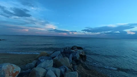 Dramatic sky fades from pink to deep blue. Nikiti, Greece Stock Footage 339609373