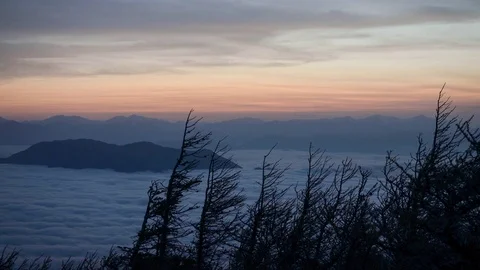 Dramatic Sky Fading into Black over a Sea of Clouds Video stock 84935844