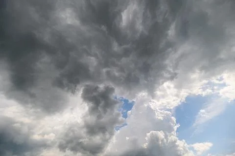 A Dramatic Sky Featuring Both Dark and Light Clouds Creates a Stunning Atmospher Stock Photos