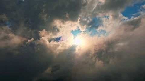 Dramatic Sky Featuring Sunlight Brilliance Breaking Through the Clouds Above Video stock 317887937