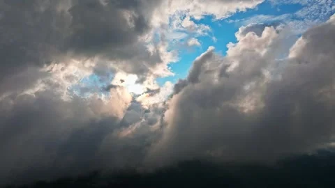 A Dramatic Sky Filled with Clouds and Sunlight Beautifully Breaking Through Stock Footage 317887821