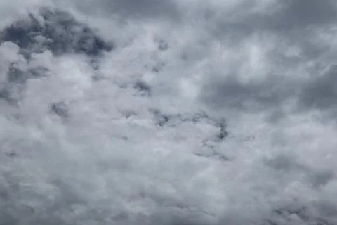 Dramatic Sky Filled with Ominous Gray Clouds Creating a Stormy Atmosphere Stock Photos