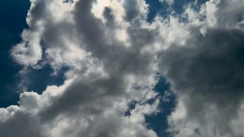 Dramatic sky with fluffy clouds against a deep blue background in a captiva.. Stock Footage 339296211