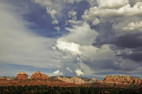 Dramatic sky in front of red rock sedona Stock Photos