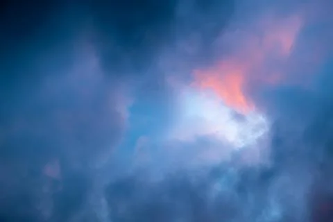 Dramatic sky full of dark clouds in bad weather before a big storm rain with a Stock Photos