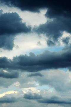 Dramatic sky with gathering storm clouds Stock Photos