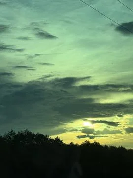 Dramatic Sky with Golden Sunset Glow Stock Photos