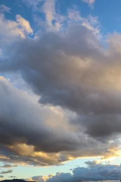 Dramatic Sky with Grey Clouds and Orange Sky around Sunset Time Stock Photos