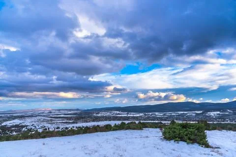 Dramatic sky landscape. Beautiful mountain view. Evergreen juniper. Stock Photos