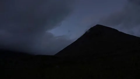 Dramatic sky with menacing clouds and mountains at dusk. Stock Footage 171447711