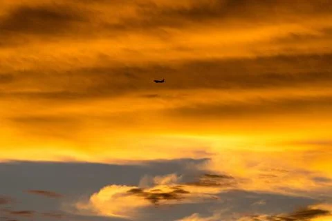 Dramatic sky with orange clouds at sunset Stock Photos