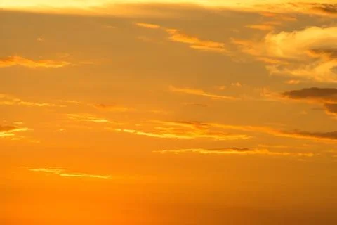 Dramatic sky with orange clouds at sunset Stock Photos