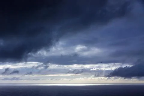 Dramatic sky over Atlantic Ocean coast near Sao Miguel Island, Azores, Portug Stock Photos