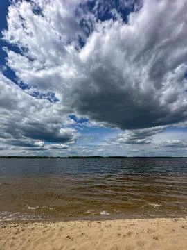 Dramatic Sky Over Calm Lake Stock Photos