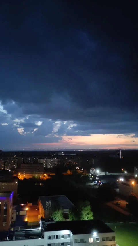 Dramatic sky over the city. Storm clouds move quickly during a storm Stock Footage 314152985