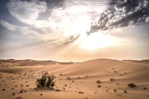 Dramatic sky over the empty quarter Stock Photos