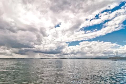 Dramatic sky over Garda lake - Italy Stock Photos