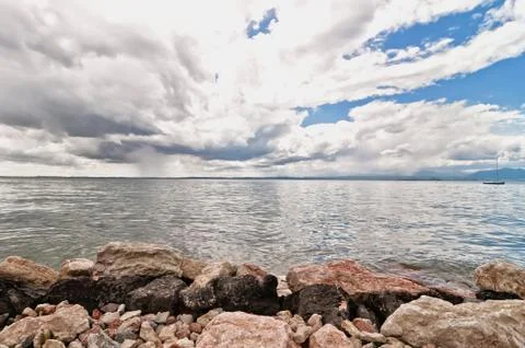 Dramatic sky over Garda lake - Italy Stock Photos