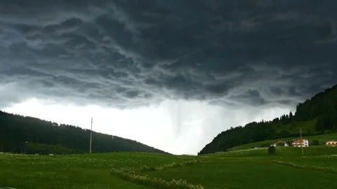 Dramatic sky over the mountains, floating clouds, time lapse Stock Footage 77575898