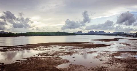 Dramatic sky over the ocean bay in Thailand Stock Photos