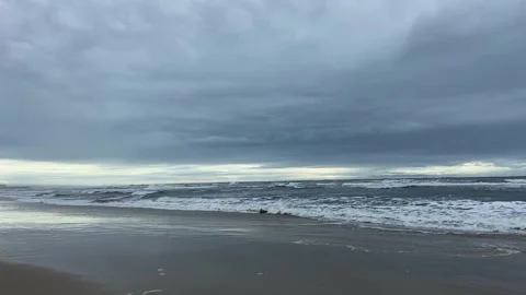 Dramatic sky over the ocean. Dramatic ocean coast. Gloomy ocean coast. Stock Footage 307314592