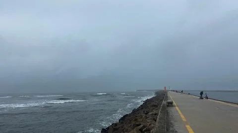 Dramatic sky over the ocean. Dramatic ocean coast. Gloomy ocean coast. Stock Footage 316392336