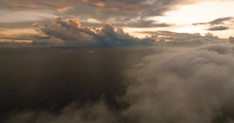 Dramatic sky over ocean with rolling fog at sunset. Seychelles, Mahe. Stock Footage 345383062