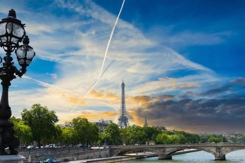 Dramatic sky over world famous Eiffel Tower in Paris Fotos Stock