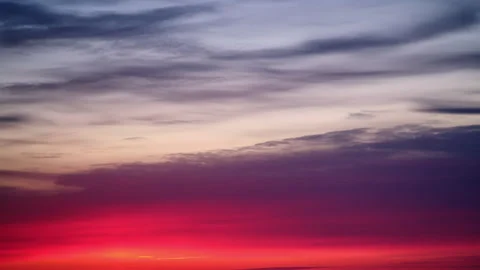 Dramatic sky with red, pink, and purple clouds at sunset, copy space. Nature Stock Footage 305493096