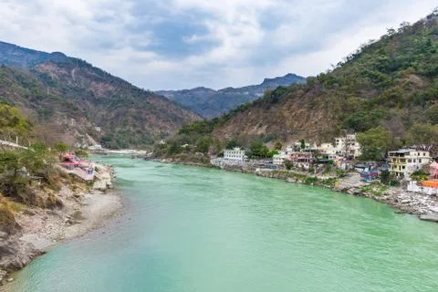 Dramatic sky at Rishikesh, holy town and travel destination in India. Colorfu Stock Photos