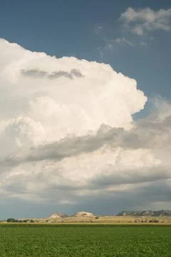 Dramatic Sky Storm Cloud Formation At Dusk Sunset The light from a sun dro... Stock Photos