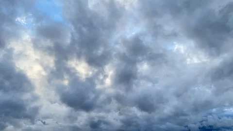 Dramatic Sky with Storm Clouds and Glimpses of Blue Stock-Footage 335289150