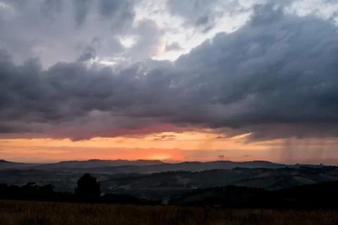 Dramatic sky before the storm on sunset Stock Photos