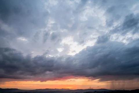 Dramatic sky before the storm on sunset Stock Photos