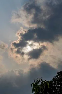 Dramatic sky with stormy clouds. Dark sky and dramatic black cloud before rai Stock Photos