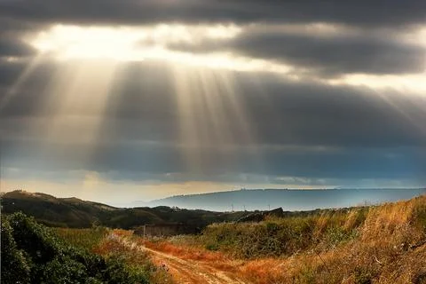 Dramatic sky with sun rays Stock Photos