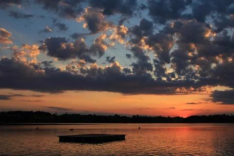 Dramatic sky at sunset, Lake Pfaeffikersee, Switzerland. Stock Photos