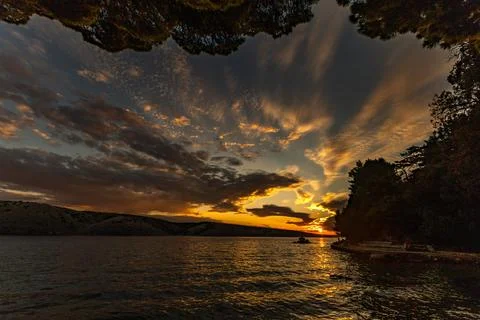 Dramatic sky, sunset in Lopar on the island of Rab, orange, red, blood-red .. Stock Photos