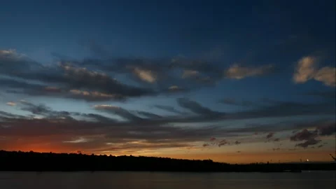 Dramatic sky at sunset over the water. Stock Footage 141618019