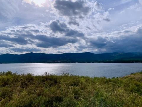 Dramatic sky. Sunset. Panoramic view. A group of clouds in the sky 库存照片