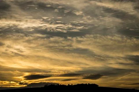 Dramatic sky at sunset. Stock Photos
