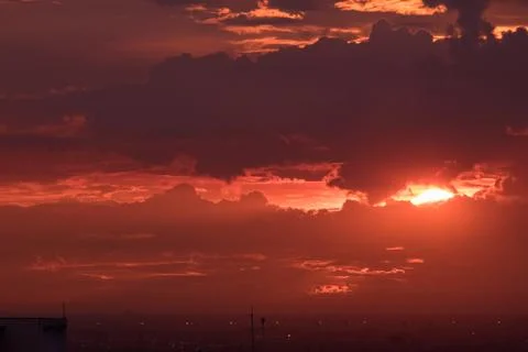Dramatic sky sunset time in the city Stock Photos