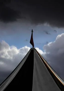 Dramatic sky with a tent Stock Photos