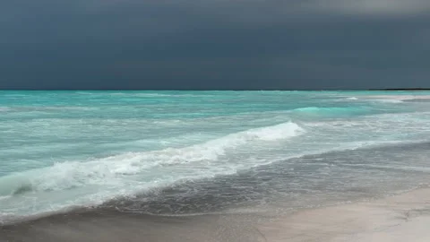 Dramatic Sky, thunderstorm approaching beautiful and pristine beach. Stock Footage 158416624