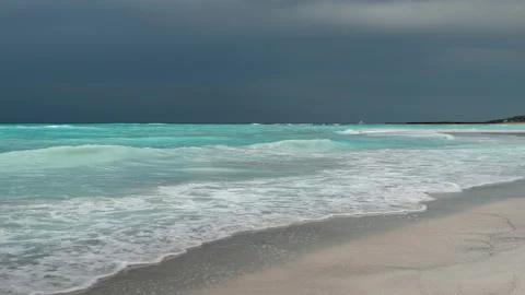 Dramatic Sky, thunderstorm approaching beautiful and pristine beach. Stock Footage 158417063