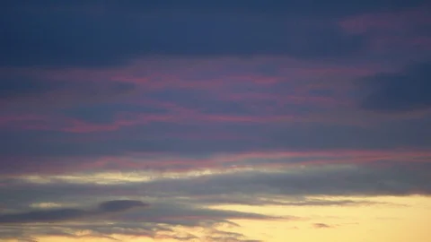Dramatic sky. Time lapse 4K. Sunset of purple pink dark blue, orange, red clouds Stock Footage 120698609